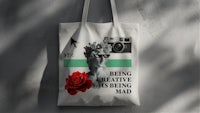 being creative is being mad tote bag